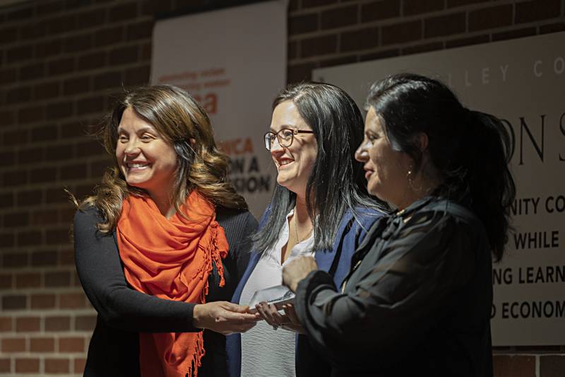 Sterling mayor Diana Merdian (center) presents the key to the city to YWCA board president Karla Belzer (left) and executive director Rebecca Munoz-Ripley Friday, Jan. 19, 2024.
