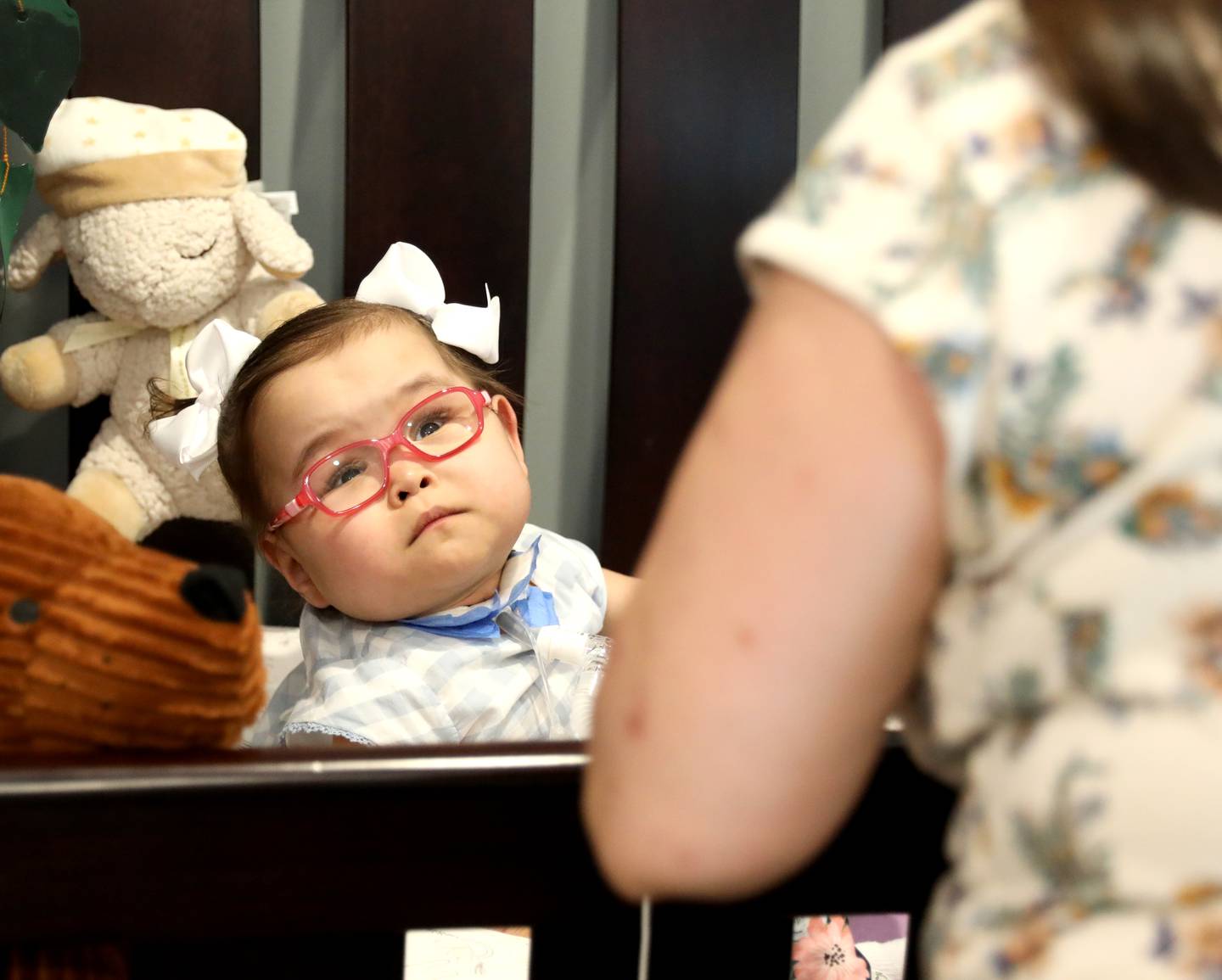 Ava Algrim looks up at her mom, Jaclyn Vasquez-Algrim in their Elburn home. Scott Algrim and Jaclyn Vasquez-Algrim welcomed twin girls Ava and Olivia prematurely in October 2020. Ava was finally able to come home on Thursday, June 2, 2022.