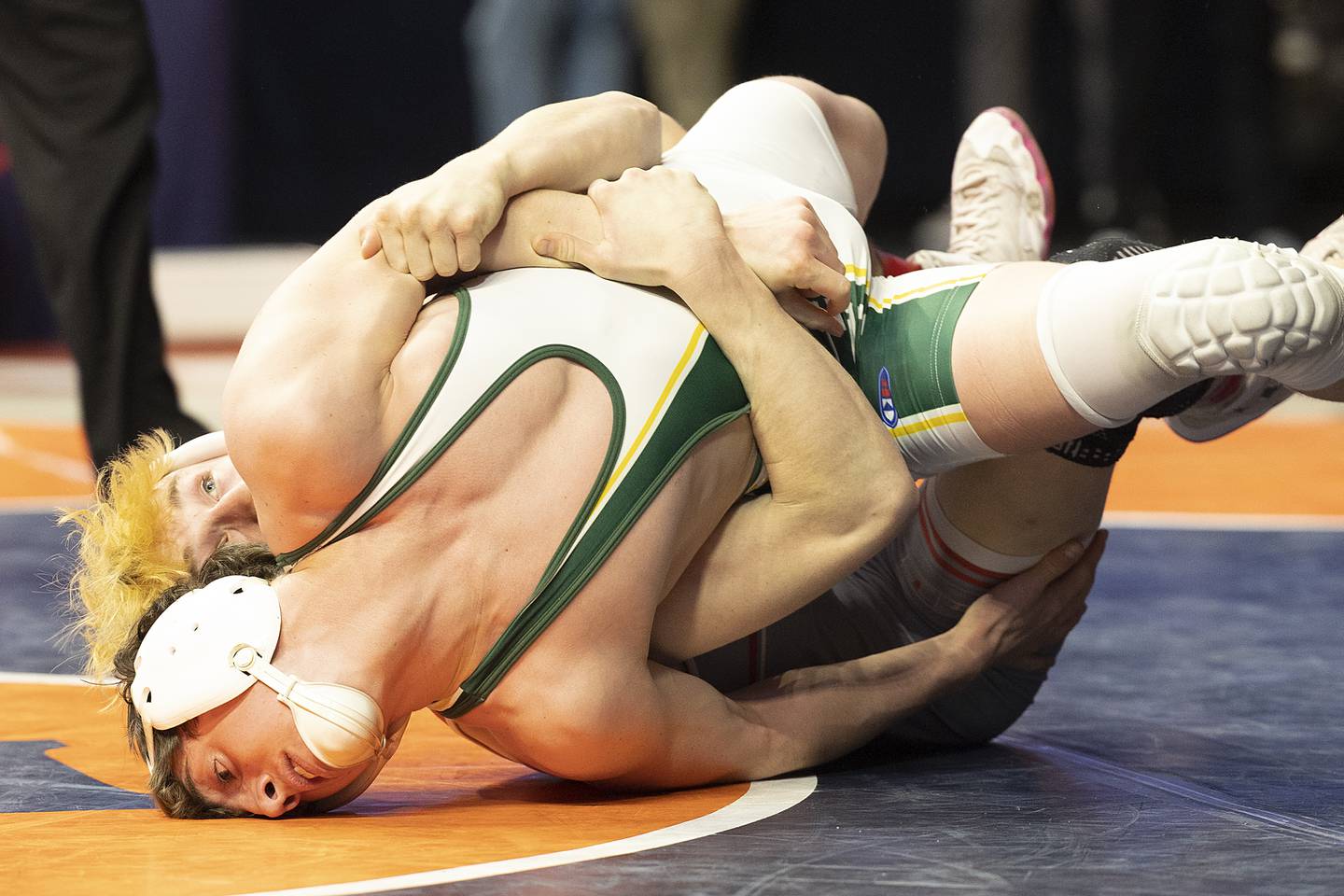 Coal City’s Cooper Morris (front) and Vandalia’s Tyson Waughtel compete in the 126 pound weight class of the 1A state individual wrestling finals Saturday, Feb. 22, 2025, at State Farm Center in Champaign.