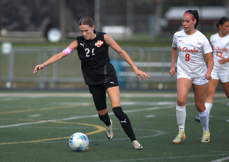 Wheaton Warrenville South's Ashlyn Adams goes after the ball during a game against St. Charles East on Friday, May 16, 2025 in Wheaton.
