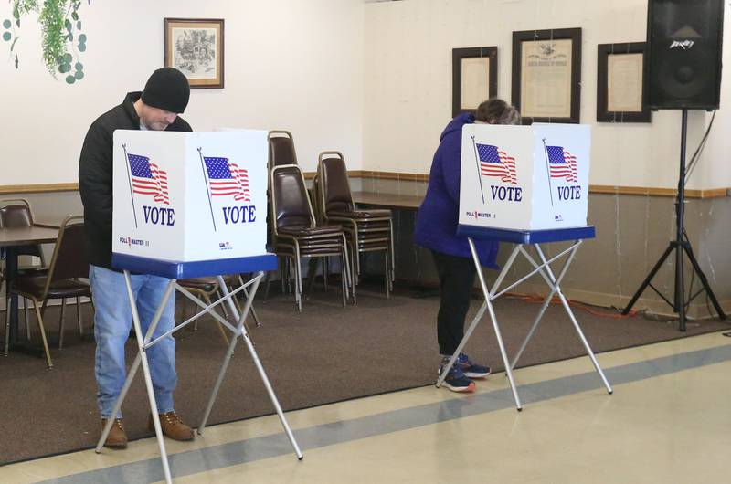 Voters fill their ballots out in voter booths on Tuesday, March 17, 2026 at the Moose Lodge in Princeton.