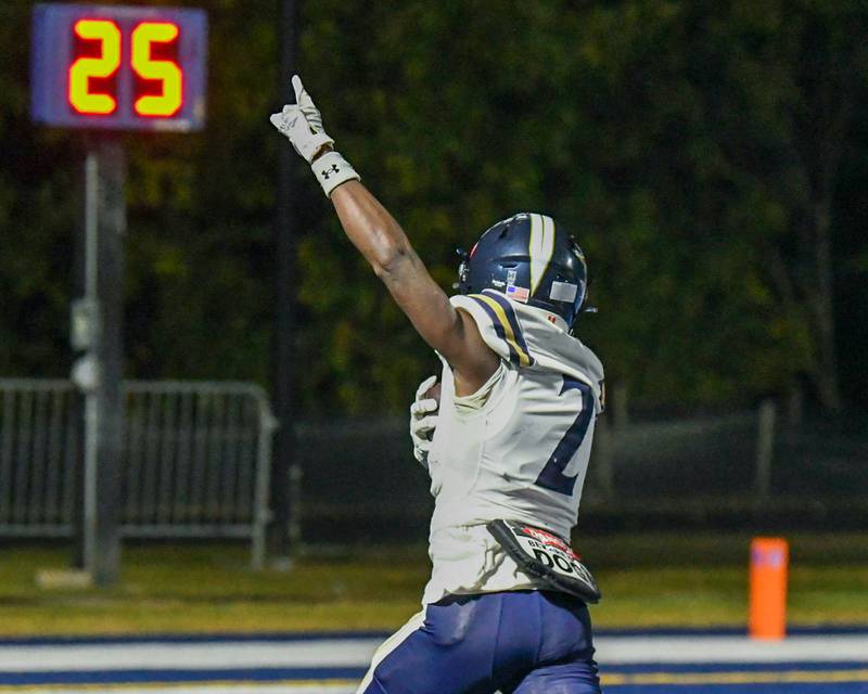 IC Catholic Prep's Quai McGee (2) celebrates as he runs into the endzone for a touchdown during the game on Friday Oct. 3, 2025, while traveling to take on St. Francis High School.
