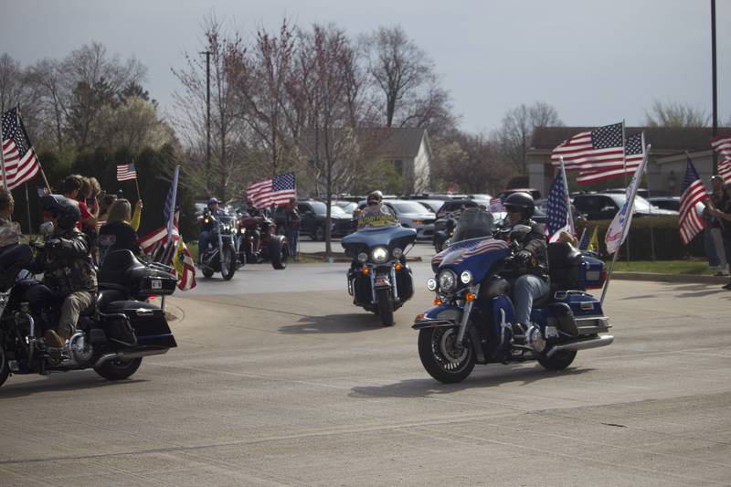 Motorcycle operators leading the funeral procession on Friday, April 18, 2025, outside Tezak Funeral Home in Joliet, for for U.S. Army Staff Sgt. Jose Dueñez Jr. He was one of four soldiers who died March 31, 2025 when their armored vehicle sunk in a bog during a training mission in Lithuania.