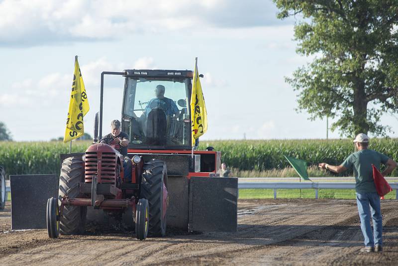 Jeff Weber hammers the throttle Thursday, July 28, 2022 during the 4750 tractor class pulls at the Lee County 4H fair.
