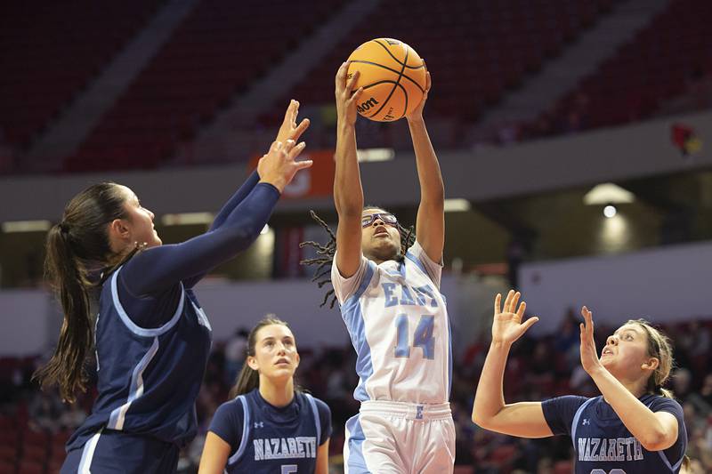Bellville East’s DeAsia Willis pulls down a rebound against Nazareth Friday, March 6, 2026, in the Class 4A girls state semifinal game at CEFCU Arena at ISU.
