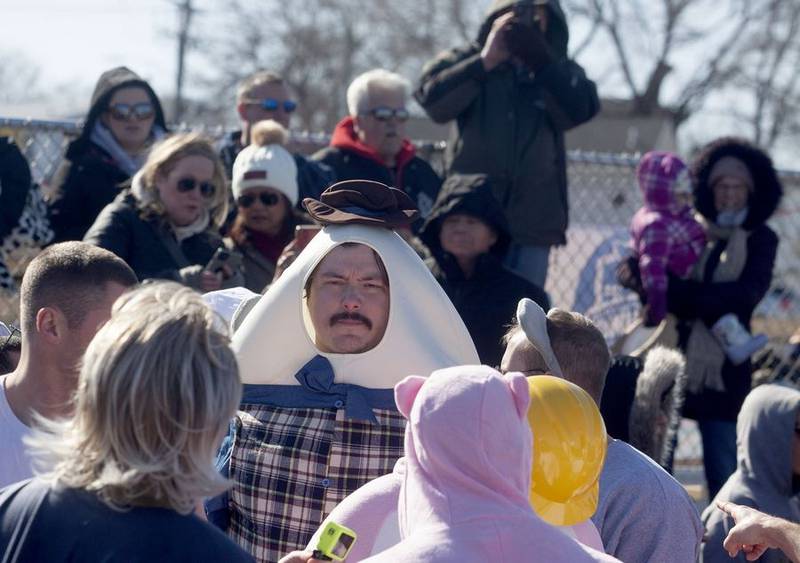 Kevin Freese of the village of Mundelein team prepares to take a dip Sunday, Feb. 20, 2022, dressed as Humpty Dumpty during the Polar Plunge in Fox Lake. The plunge raised an estimated $52,000 for Special Olympics Illinois.