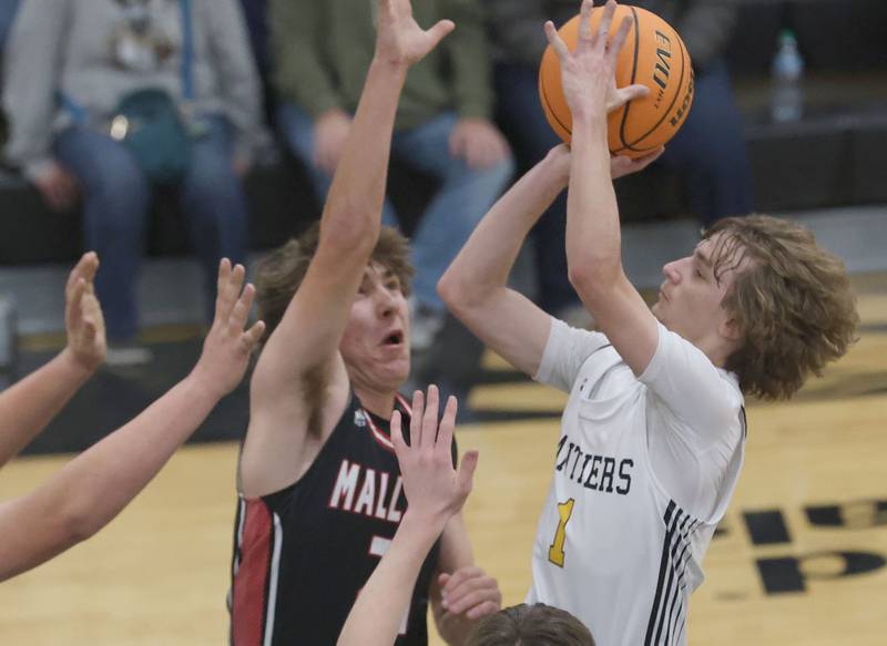 Putnam County's Jacob Furar shoots a jump shot over Henry-Senachwine's Carson Rowe on Friday, Dec. 5, 2025 at Putnam County High School.