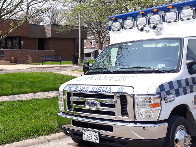 An Advanced Medical Transport ambulance parked in front of Streator City Hall on Tuesday, May 10, 2022, as its personnel attended a City Council Committee of the Whole meeting to discuss the future of emergency ambulance service in the community.