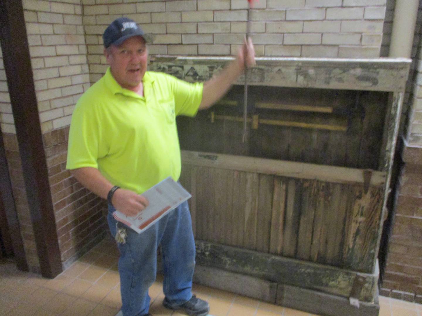 Joliet Maintenance Engineer Craig Smith shows an old Union Station scale capable of measuring up to 6,000 pounds that he has put on display in a station hallway.