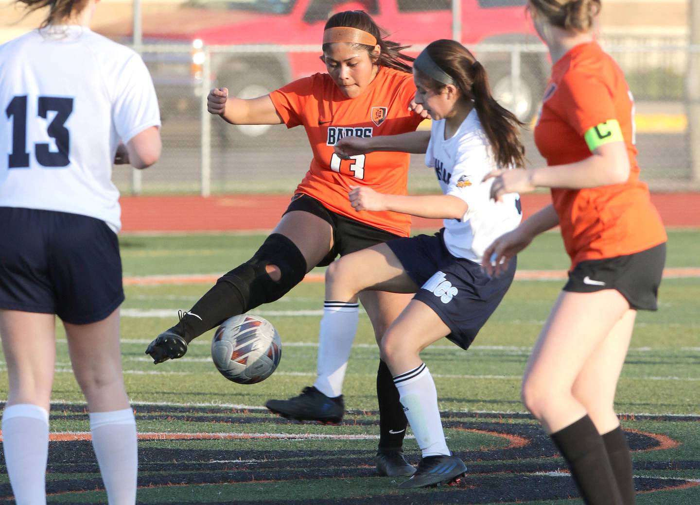 DeKalb's Carla Murrieta and Guilford's Alexa Herrera Robles battle for possession during their game Monday, April 10, 2023, at DeKalb High School.