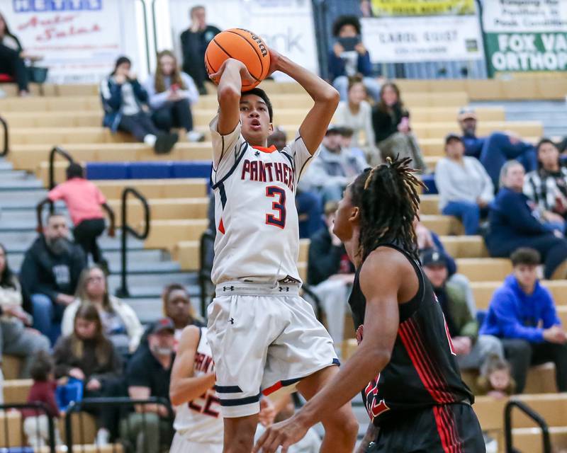 Oswego's Ethan Vahl (3) shoots a jumper during their basketball game between Yorkville at Oswego, Tuesday Dec 10, 2024 in Oswego.