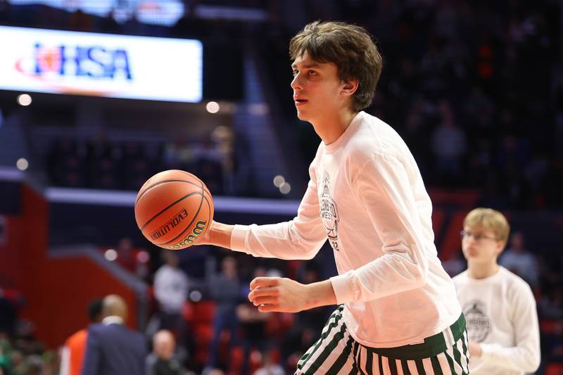 Glenbard West’s Braden Huff warms up before the game against Whitney Young in the Class 4A championship game at State Farm Center in Champaign. Saturday, Mar. 12, 2022, in Champaign.