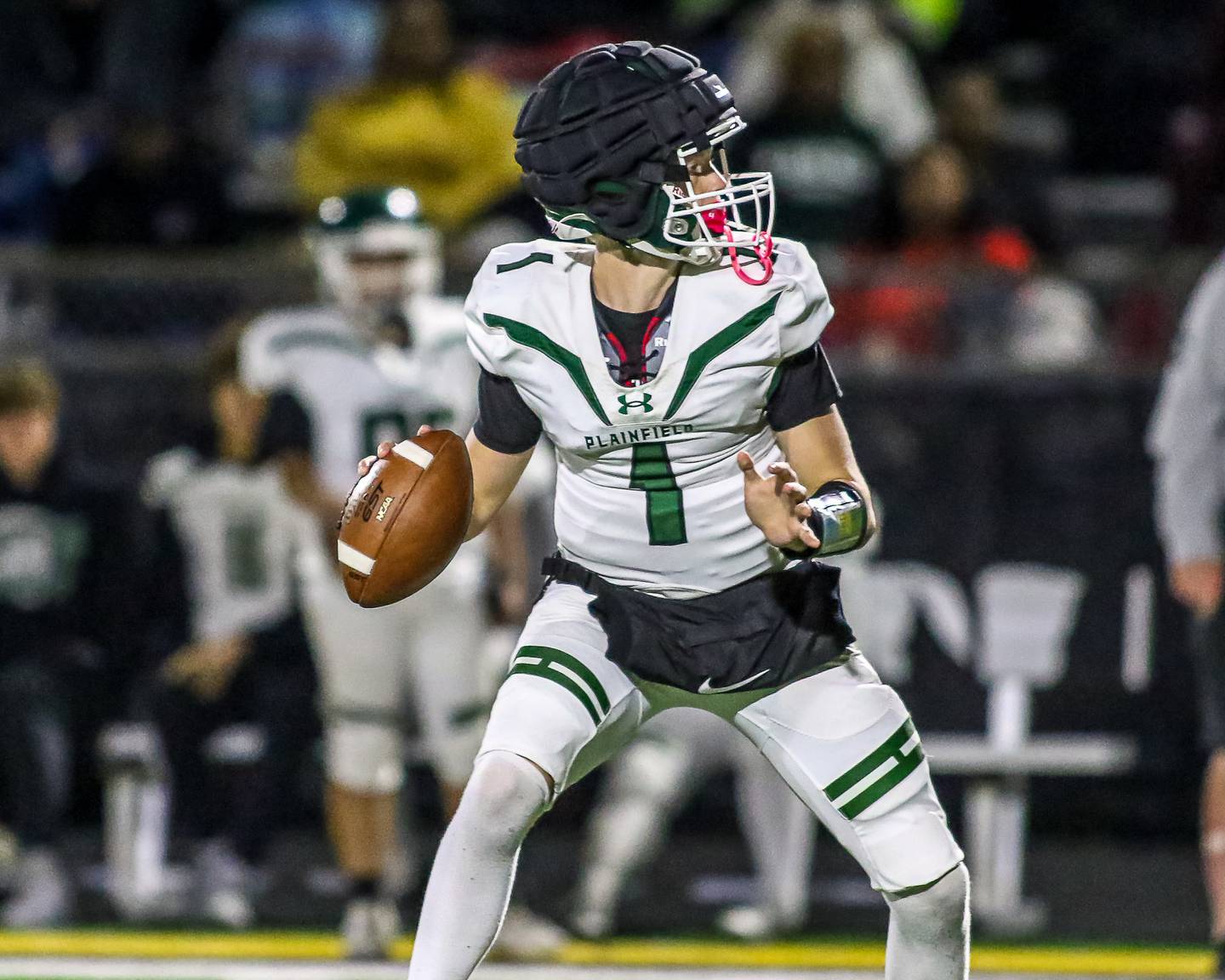 Plainfield Central's Tommy Morrisette drops back to pass during a football game between Plainfield Central at Joliet West on Friday, Oct 25th, 2024  in Joliet.