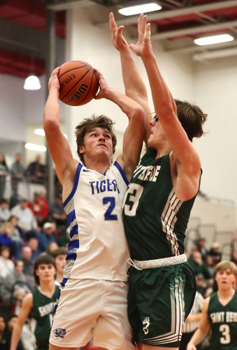 Princeton's Teegan Davis shoots over St. Bede's Landon Jackson Saturday night.