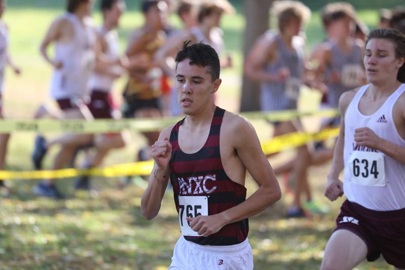 Plainfield North’s Oliver Burns leads the pack at the start in the Boys Cross Country Class 3A Minooka Regional at Channahon Community Park on Saturday.