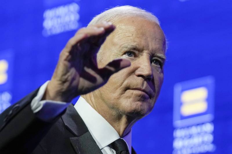 President Joe Biden waves to the crowd after speaking at the 2023 Human Rights Campaign National Dinner, Saturday, Oct. 14, 2023, in Washington.