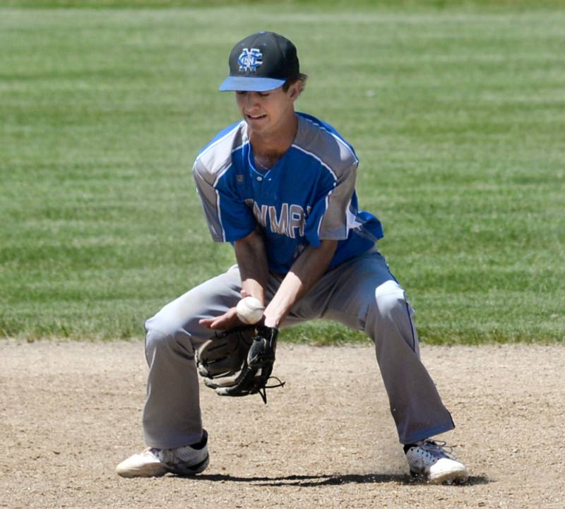 Newman's Kyle Wolfe fields a ground ball at short during the championship game with Dakota at the 1A Pearl City Sectional on Saturday, May 27.