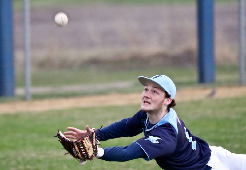 Bureau Valley left fielder Brock Foster makes a diving catch Wednesday against Newman. The Comets won 4-0.