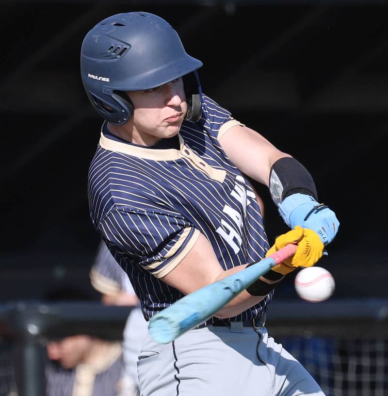 Hiawatha's Tim Pruitt makes contact during their game against South Beloit Thursday, April 16, 2026, at Northern Illinois University in DeKalb.