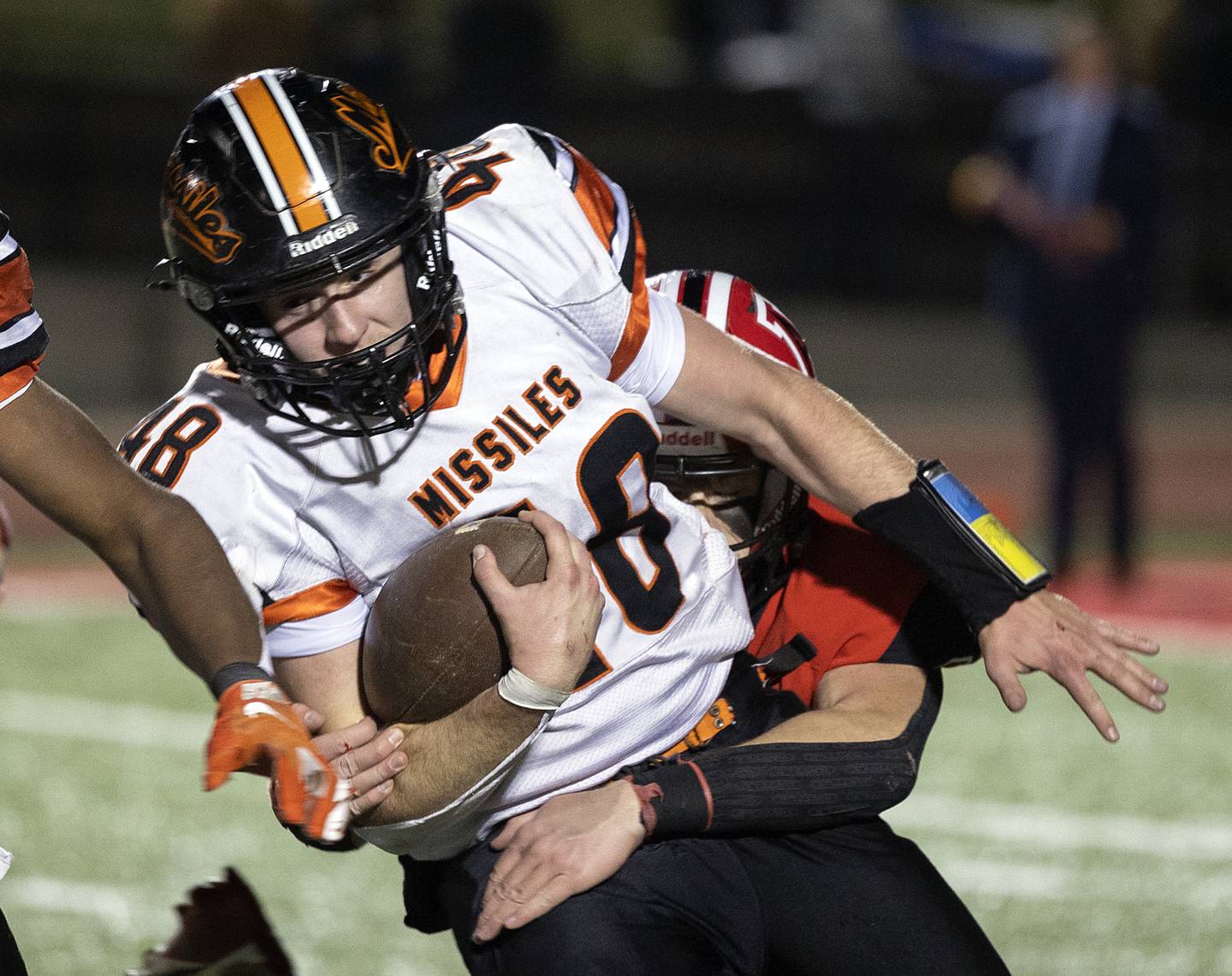 Milledgeville’s Karter Livengood is tackled by Amboy’s Brayden Klein Friday, Nov. 22, 2024, during the 8-man football championship in Monmouth.
