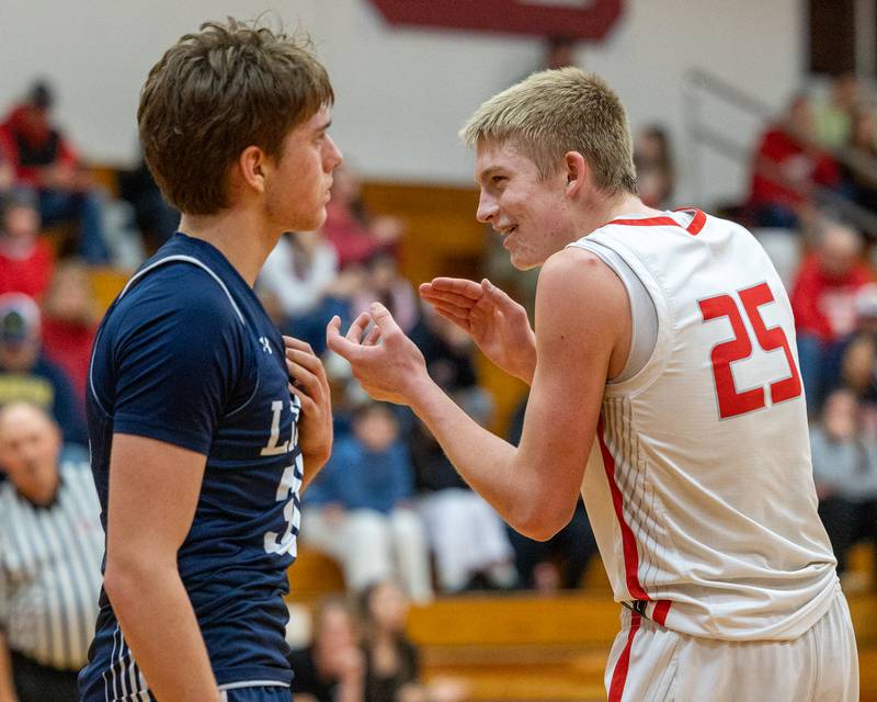 Streator's Joseph Hoekstra (25) reacts after scoring on Lisle's Noah Nigro (30) in celebration on Wednesday, Feb. 18, 2026 at Streator High School in Streator.