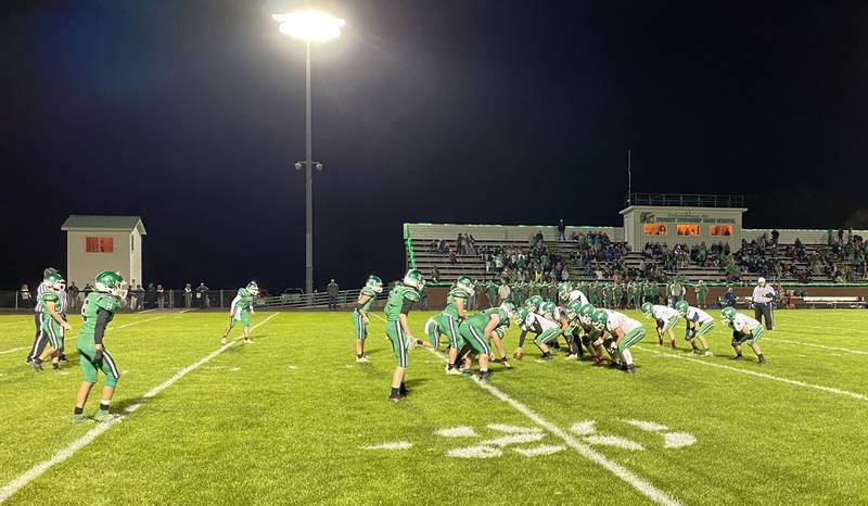 Seneca's offense (at right) lines up just ahead of the snap Friday, Oct. 22, 2021, at Dwight during the Fighting Irish's 42-6, season-ending victory.