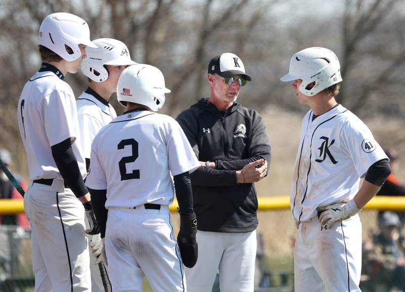 Kaneland head coach Brian Aversa talks to his players during a break in the action of their game against DeKalb Saturday, April 12, 2025, at Kaneland High School in Maple Park.