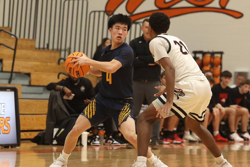 Neuqua Valley’s Garrick Chong works the ball against Lincoln-Way West on Saturday, Feb. 1, 2025.