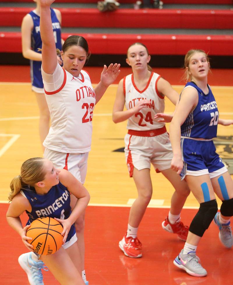 Princeton's Paige Jesse eyes the hoop as Ottawa's Mary Stisser defends on Monday, Feb. 3, 2025 in Kingman Gymnasium at Ottawa High School.