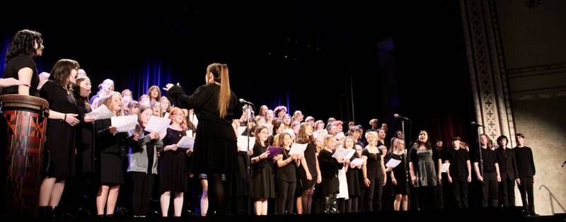 The combined choirs of Madison, Reagan and Dixon schools perform the South African freedom song "Tschotsholoza" on Friday, March 3, 2023, at Wiltz Auditorium. About 600 people attended the performance.