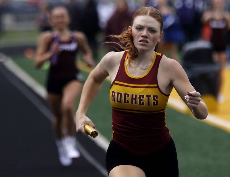 Richmond-Burton’s Emerson Wold runs the last leg of the 4X800 meter relay during the IHSA Class 2A Johnsburg Girls Track and Field Sectional Meet on Wednesday, May 13, 2026, at Johnsburg High School.