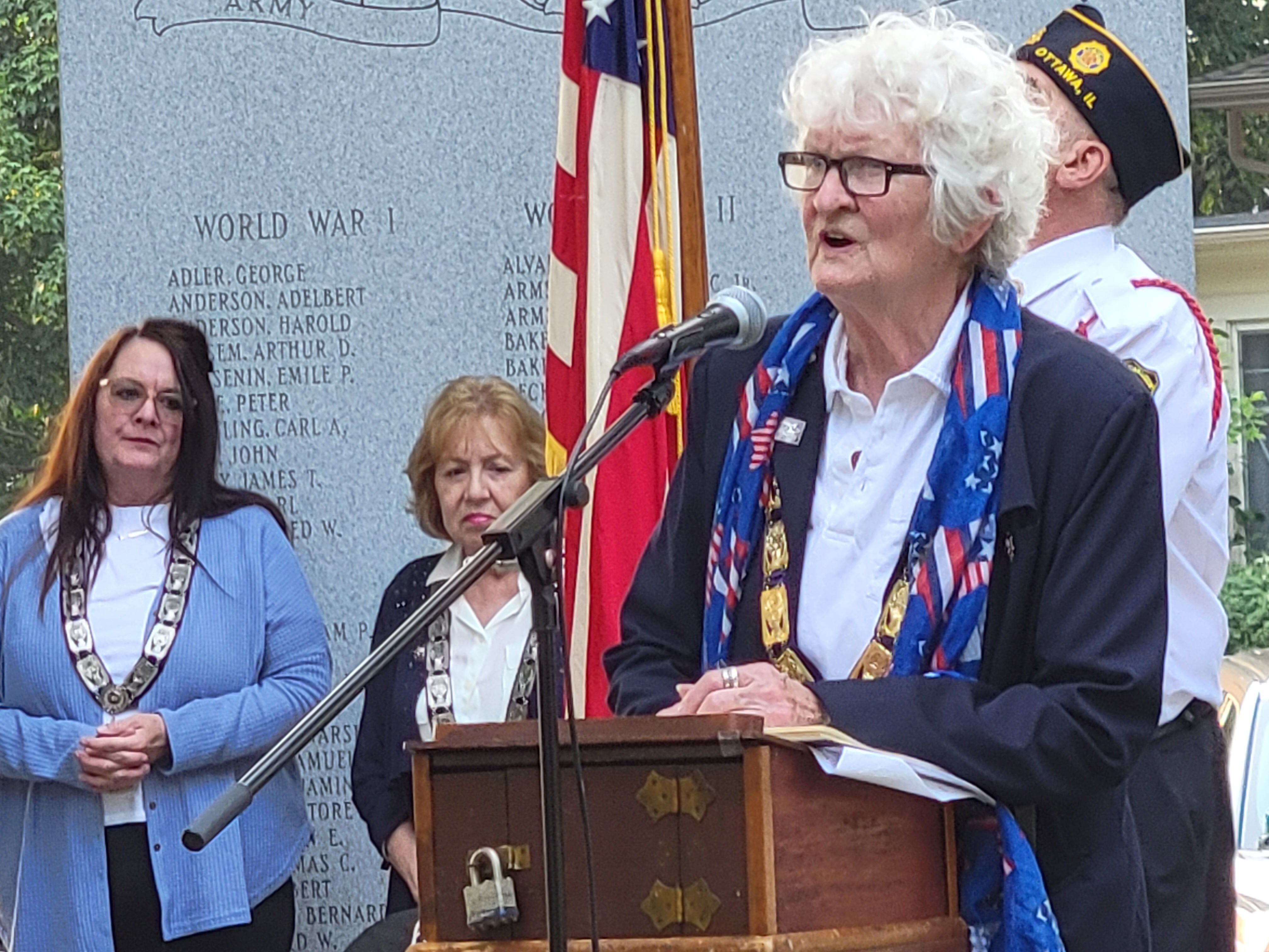Lynne Schlink, exalted ruler of Ottawa Elks Lodge 588, delivers remarks Wednesday, June 14, 2023, during Flag Day ceremonies at Washington Square in Ottawa.