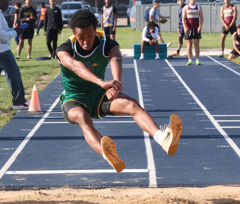Coal City's Alexander Collins competes in the triple jump during the Class 2A Sectional on Wednesday, May 20, 2026 at Pontiac High School.
