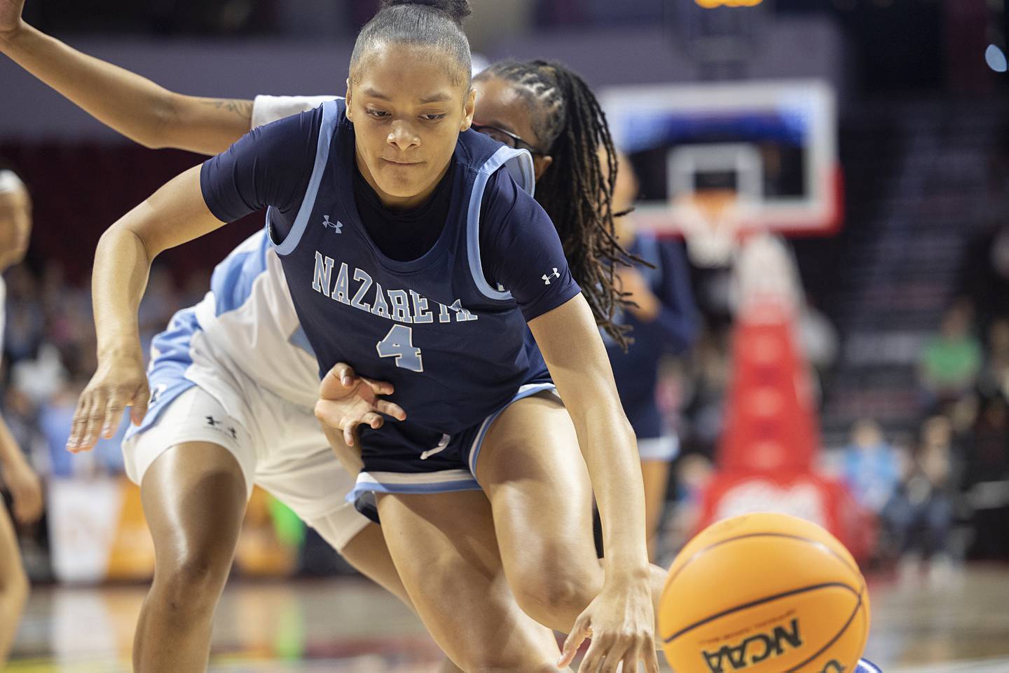 Nazareth's Mia Gage chases a loose ball against Belleville East Friday, March 6, 2026, in the Class 4A girls state semifinal game at CEFCU Arena at ISU.
