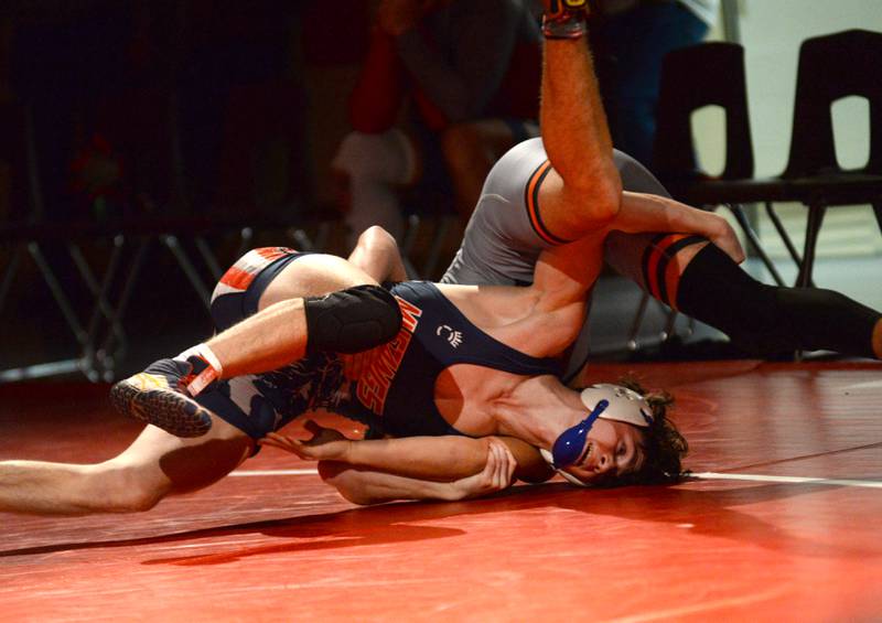Morrison's Zach Milder (bottom) lifts his Sandwich opponent in a 138-pound match at a triangular meet with Oregon on Friday, Jan. 31, 2025 in the Blackhawk Center at Oregon High School.