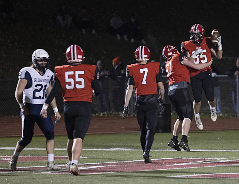 Amboy’s Brennan Blain celebrates a TD against Ridgewood during the I8FA championship Friday, Nov.17, 2023 at Monmouth College
