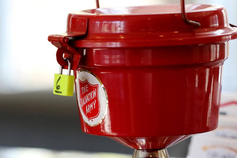 A Salvation Army red kettle sits on the reception desk at the Cary-Grove Area Chamber of Commerce on Monday, Nov. 16, 2020 in Cary.