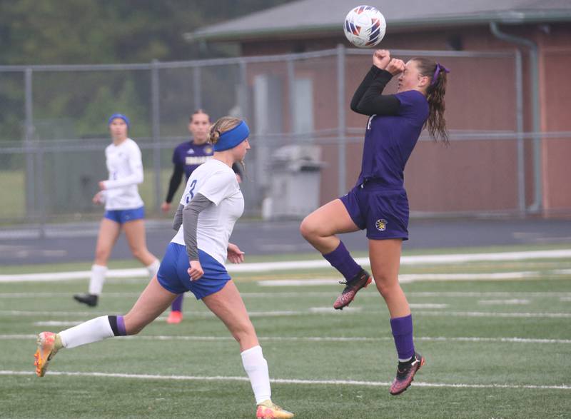 Mendota's Ella Cross looks to apply a header as Princeton's Chloe Ostrowski defends during the Class 1A Regional final game on Tuesday, May 20, 2025 at Mendota High School.