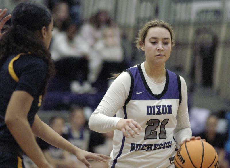 Dixon player Reese Dambman brings the ball upcourt. Dixon and Sterling girls basketball teams played in the 3rd place game of the Dixon Girls KSB Holiday Basketball Classic Saturday, Dec. 28, 2024.
