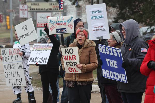 DeKalb rally draws dozens against U.S. military operation in Venezuela 