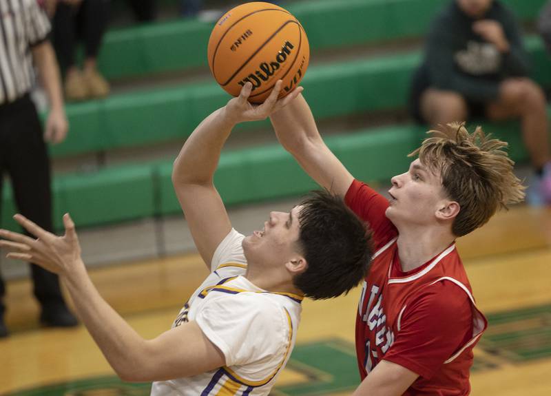 Oregon’s Brian Wallace was called for a foul on Mendota’s Drew Becker Friday, Feb. 27, 2026, at the Class 2A Rock Falls boys basketball regional.