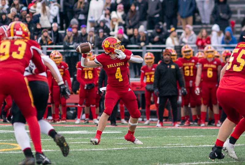 Batavia's Charlie Whelpley (4) throws an option pass against Yorkville during a 7A quarterfinal playoff football game at Batavia High School on Saturday, Nov 12, 2022.