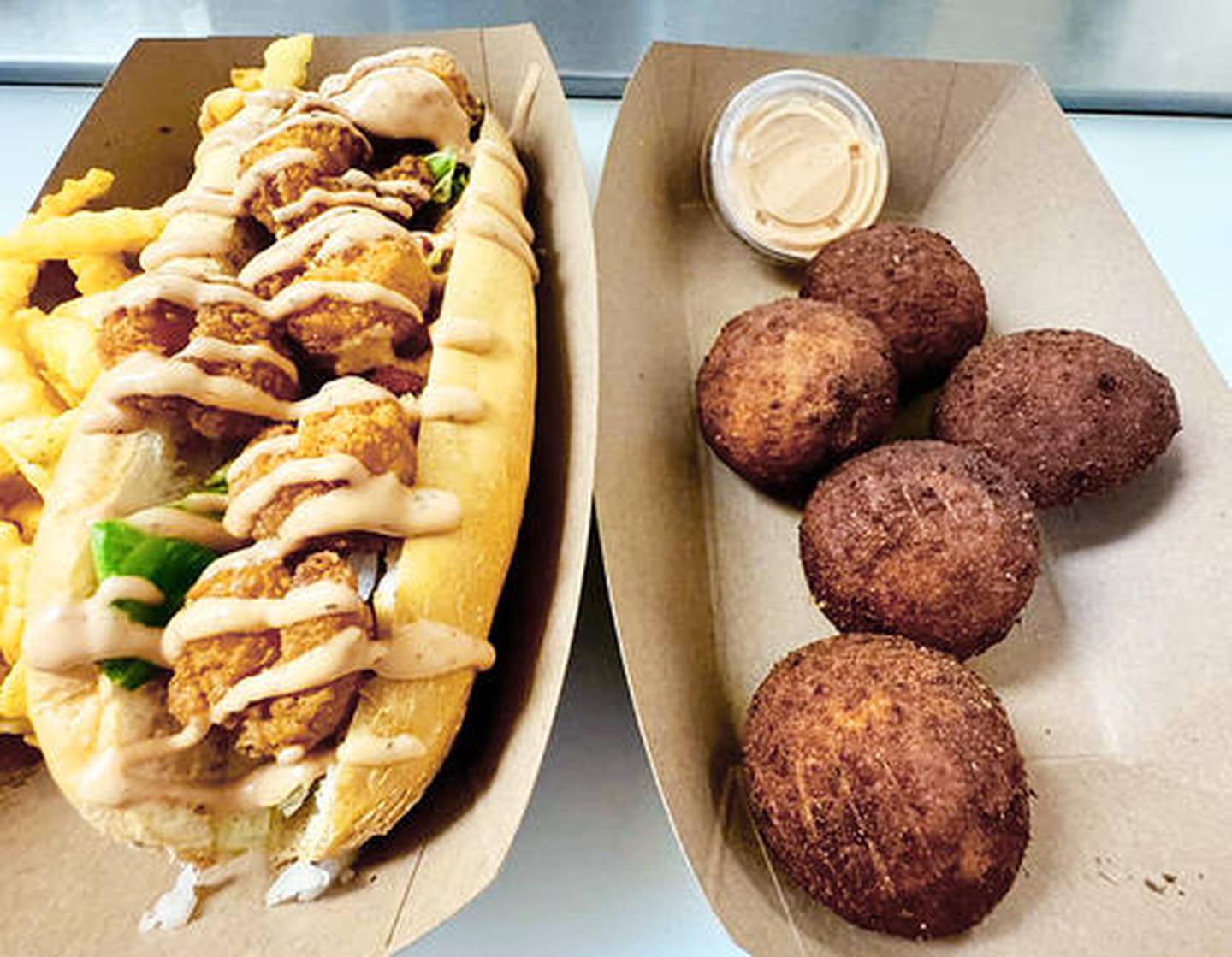 Shrimp Po Boy sandwich and Bayou Balls at Uncle B's Bar & Grill in Amboy.