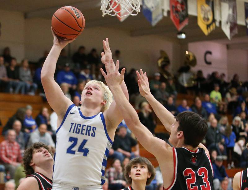 Princeton's Daniel Sousa eyes the hoop as Hall's Braden Curran defends on Friday, Jan. 26, 2024 at Princeton High School.