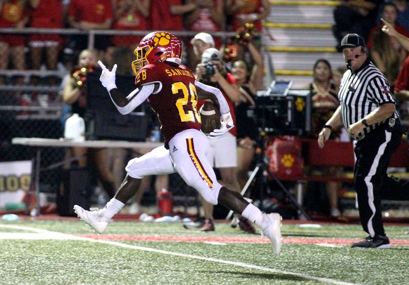 Batavia's AJ Sanders runs for a touchdown during the first game of the season against Phillips in Batavia on Friday, Aug. 27, 2021.