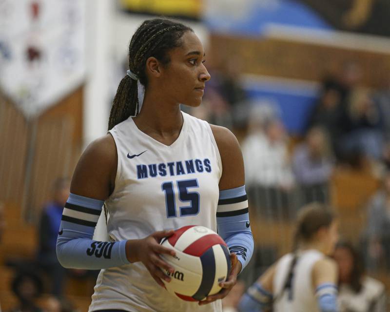 Downers Grove South's Ciara Steward (15) sets up to serve during Class 4A Lyons Sectional Semifinal volleyball match between Downers Grove South at Downers Grove North. Nov 4, 2025 in La Grange.