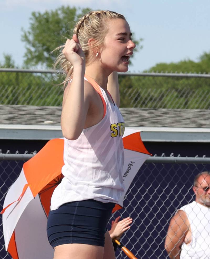 Sterling’s Finley Ryan celebrates after clearing the bar with a state qualifying pole vault Wednesday, May 8, 2024, during the girls track Class 2A sectional at Rochelle High School.