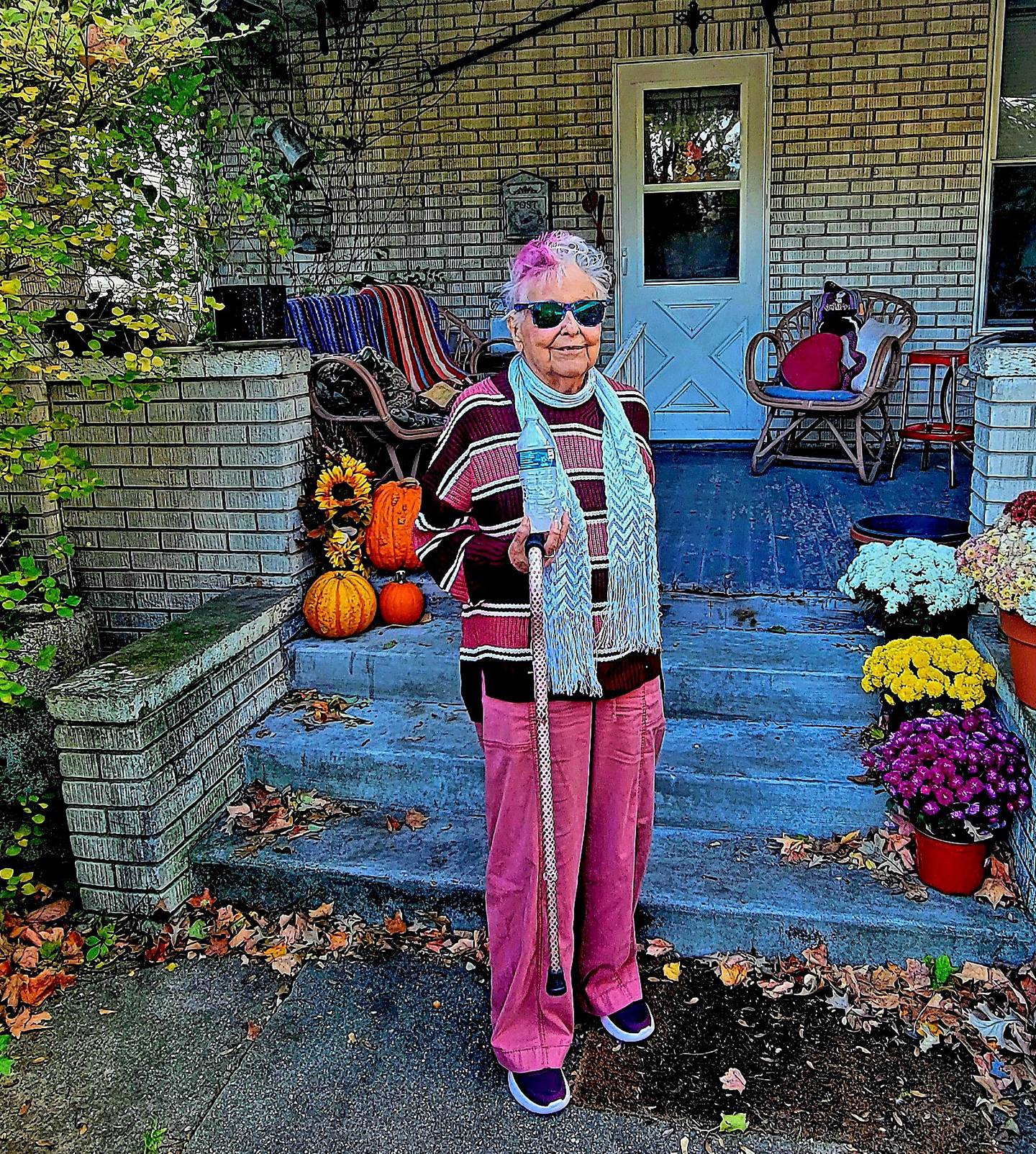 Jo Dergo stands outside her home in Morris.