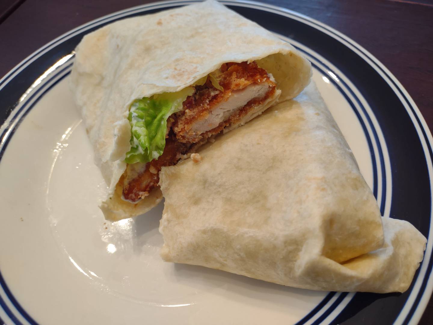 The bacon chicken ranch wrap is served with full chicken breasts at 0-9ers' Pub in Streator.