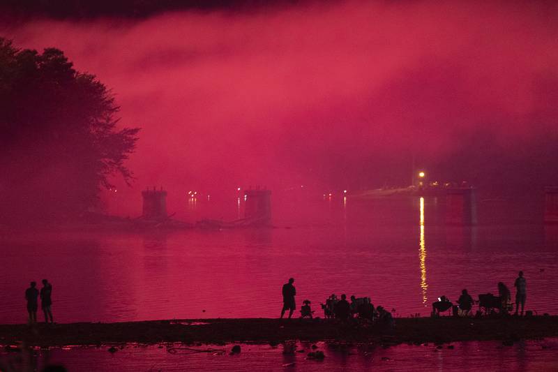 Spectators watch as fireworks illuminate the sky Monday, July 3, 2023 at Petunia Fest in Dixon. 90’s rock band Everclear finished off the weekend after the fireworks with a show on the main stage in downtown Dixon.